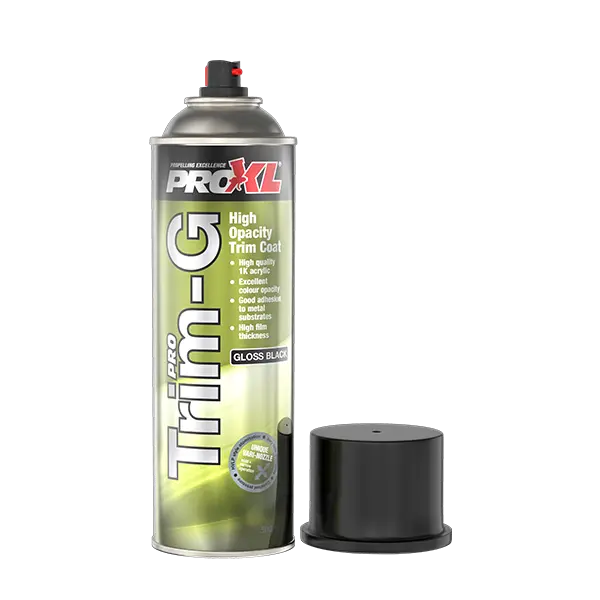 A can of ProXKL Trim-G gloss black spray trim coat stands upright on a white background, with its black cap placed beside it.